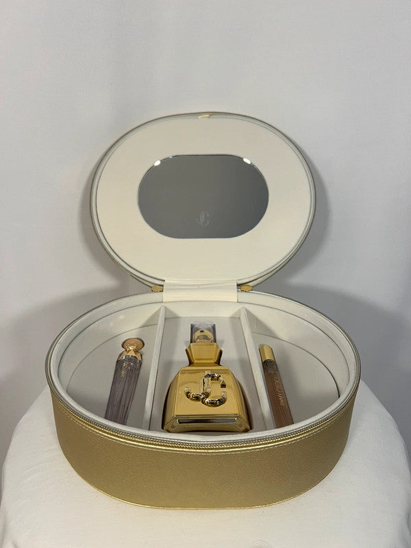 Coffret doré avec parfums et gloss