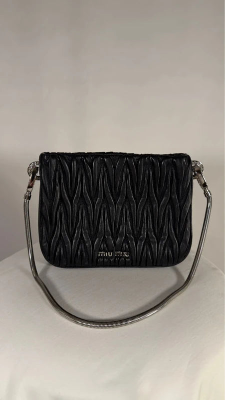 Pochette matelassée Sassy noire