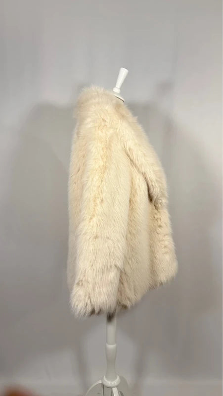 Manteau en imitation fourrure crème