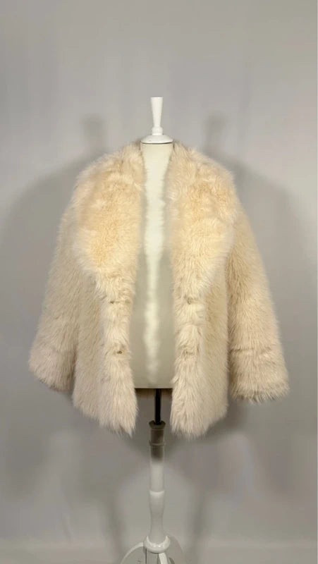 Manteau en imitation fourrure crème