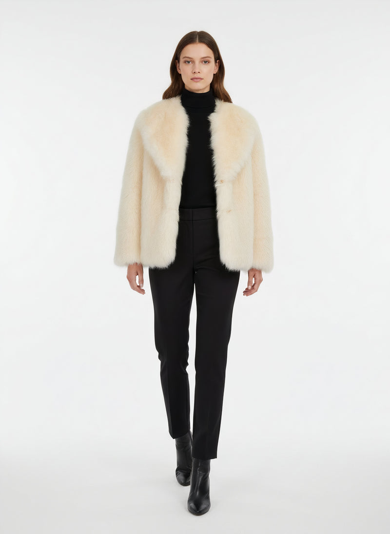 Manteau en imitation fourrure crème